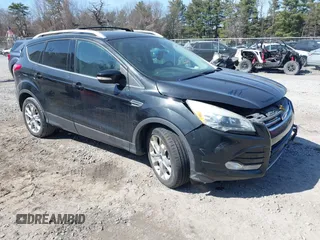 2014 Ford Escape Titanium with VIN 1FMCU9JX2EUA96338, listed as a IAAI auction lot 41806850 with 127,745 mi miles. Bid and sale history available at carsss.com. Image 1.
