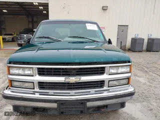 1996 Chevrolet Tahoe with VIN 1GNEK13R1TJ388054, listed as a IAAI auction lot 41368047 with 155,138 mi miles. Bid and sale history available at carsss.com. Image 6.