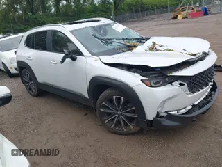 2024 Mazda CX-50 2.5 Turbo with VIN 7MMVABXY5RN179095, listed as a IAAI auction lot 42315952 with 31,987 mi miles and . Bid and sale history available at DreamBid. Image 1.