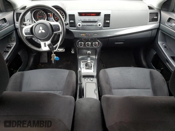 2011 Mitsubishi Lancer with VIN JA32Y6HV4BU034165, listed as a Copart auction lot 85783924 with 87,494 mi miles and Salvage Title. Bid and sale history available at DreamBid. Image 8.