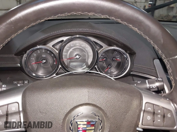 2011 Cadillac CTS z VIN 1G6DC5EY0B0167517, wystawiony jako IAAI lot #41657144 z przebiegiem Nie podano mil oraz . Historia ofert i sprzedaży dostępna na DreamBid. Obrazek 7.