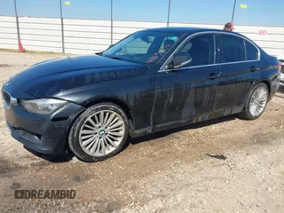 2014 BMW 3 Series 328d with VIN WBA3D3C55EK154125, listed as a IAAI auction lot 41651614 with 193,952 mi miles and . Bid and sale history available at carsss.com. Image 2.
