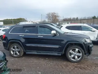2013 Jeep Grand Cherokee Limited with VIN 1C4RJFBT9DC592257, listed as a IAAI auction lot 40955180 with 130,038 mi miles. Bid and sale history available at carsss.com. Image 13.