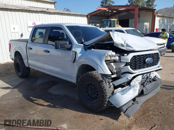 2021 Ford F-150 XL with VIN 1FTEW1CP5MKD48227, listed as a IAAI auction lot 42272809 with 87,614 mi miles and . Bid and sale history available at DreamBid. Image 1.