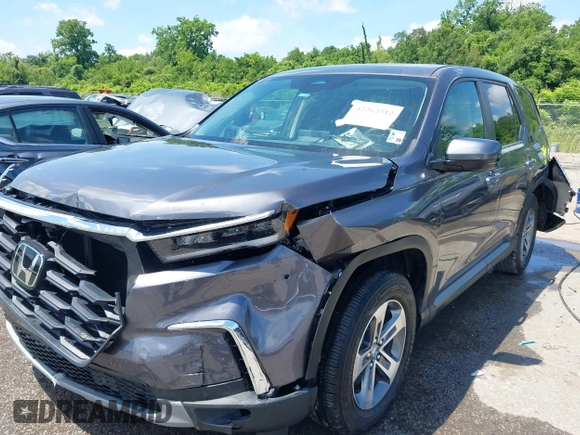2025 Honda Pilot EX-L z VIN 5FNYG2H43SB010172, wystawiony jako IAAI lot #42262312 z przebiegiem 9 853 mil mil oraz . Historia ofert i sprzedaży dostępna na DreamBid. Obrazek 17.