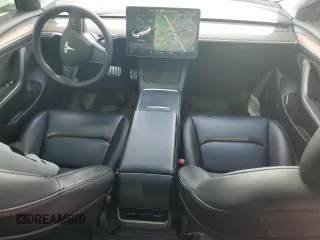 2021 Tesla Model 3 Standard Range Plus z VIN 5YJ3E1EA1MF064335, wystawiony jako Copart lot #57133955 z przebiegiem 60 024 mil mil oraz Szkody całkowita. Historia ofert i sprzedaży dostępna na DreamBid. Obrazek 8.