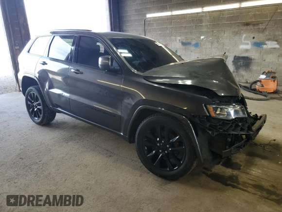 2020 Jeep Grand Cherokee Altitude with VIN 1C4RJFAG5LC243180, listed as a Copart auction lot 49681785 with 102,440 mi miles and Salvage Title. Bid and sale history available at carsss.com. Image 4.