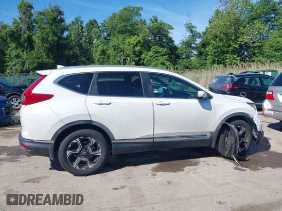 2019 Honda CR-V Touring с VIN JHLRW2H98KX003911, выставлен на аукционе IAAI как лот 42306400 с пробегом 105 780 миль миль и . История ставок и продаж доступна на DreamBid. Изображение 13.