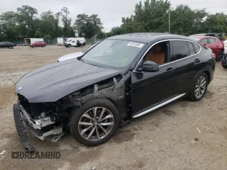 2019 BMW X4 xDrive30i with VIN 5UXUJ3C51KLG52927, listed as a Copart auction lot 65533883 with 53,056 mi miles. Bid and sale history available at carsss.com. Image 1.