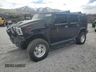 2004 Hummer H2 z VIN 5GRGN23U74H100175, wystawiony jako Copart lot #52642125 z przebiegiem 112 305 mil mil oraz Szkoda całkowita • Salvage title. Historia ofert i sprzedaży dostępna na DreamBid. Obrazek 1.