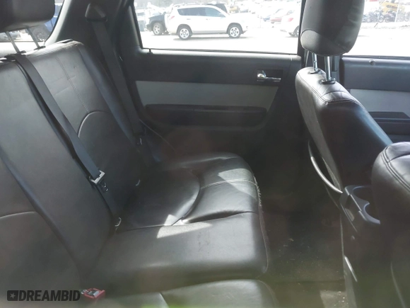 2010 Mercury Mariner Premier with VIN 4M2CN8HG3AKJ18896, listed as a IAAI auction lot 41616731 with 217,803 mi miles. Bid and sale history available at carsss.com. Image 8.