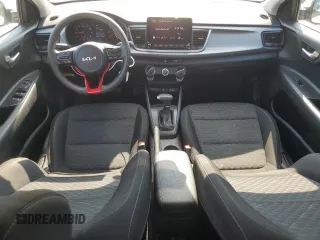 2023 Kia Rio S z VIN 3KPA24AD4PE561052, wystawiony jako Copart lot #55316785 z przebiegiem 94 184 mil mil oraz Nie do naprawy • Non repairable. Historia ofert i sprzedaży dostępna na DreamBid. Obrazek 8.