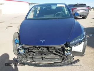 2024 Tesla Model 3 Long Range with VIN 5YJ3E1EB2RF758998, listed as a IAAI auction lot 41861108 with 14,531 mi miles and . Bid and sale history available at DreamBid. Image 13.