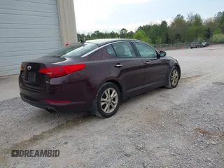 2013 Kia Optima LX with VIN 5XXGM4A73DG234806, listed as a IAAI auction lot 41917871 with 219,058 mi miles. Bid and sale history available at carsss.com. Image 4.