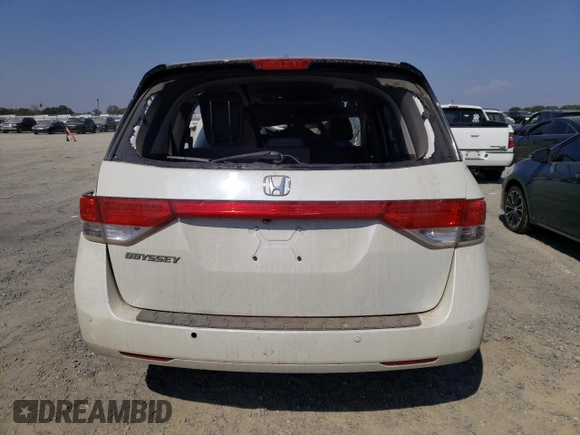 2015 Honda Odyssey Touring Elite z VIN 5FNRL5H90FB033511, wystawiony jako Copart lot #67718683 z przebiegiem Nie podano mil oraz Szkoda całkowita • Salvage title. Historia ofert i sprzedaży dostępna na DreamBid. Obrazek 6.