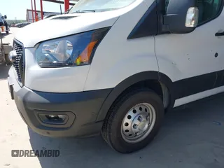 2022 Ford Transit Cargo with VIN 1FTBW3X89NKA69141, listed as a IAAI auction lot 41980864 with 102,721 mi miles and . Bid and sale history available at DreamBid. Image 17.