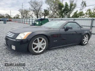 2005 Cadillac XLR z VIN 1G6YV34A855601131, wystawiony jako Copart lot #88100685 z przebiegiem 108 720 mil mil oraz Szkody całkowita. Historia ofert i sprzedaży dostępna na DreamBid. Obrazek 1.