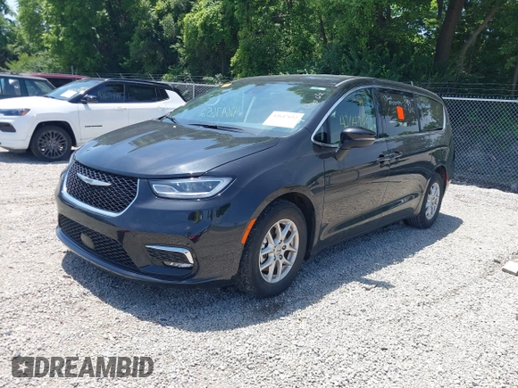 2023 Chrysler Pacifica Touring L with VIN 2C4RC1BG1PR606504, listed as a IAAI auction lot 42647652 with 41,598 mi miles and . Bid and sale history available at DreamBid. Image 19.