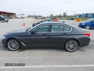 2019 BMW 5 Series 530i xDrive with VIN WBAJA7C5XKWW31983, listed as a IAAI auction lot 41893477 with 127,535 mi miles and . Bid and sale history available at carsss.com. Image 14.