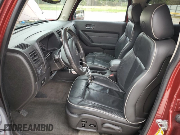 2010 Hummer H3 with VIN 5GTMNLEP0A8140183, listed as a Copart auction lot 77991624 with 148,563 mi miles and Clean Title. Bid and sale history available at DreamBid. Image 7.