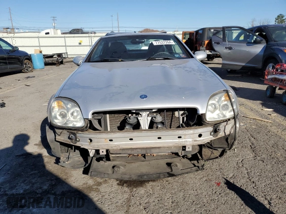 2000 Mercedes-Benz SLK-Class Kompressor with VIN WDBKK47F2YF150980, listed as a Copart auction lot 77537264 with 82,206 mi miles and Salvage Title. Bid and sale history available at carsss.com. Image 5.