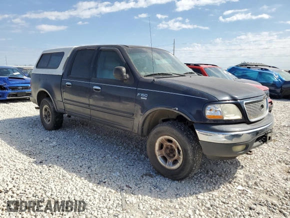 2001 Ford F-150 XLT with VIN 1FTRW08W41KF57904, listed as a Copart auction lot 47250035 with 185,985 mi miles and Clean title. Bid and sale history available at DreamBid. Image 4.
