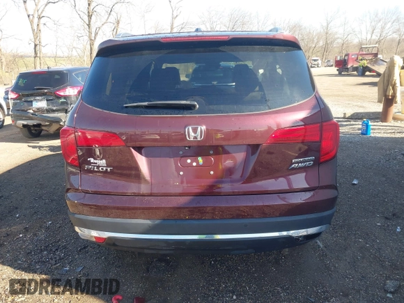 2016 Honda Pilot Touring with VIN 5FNYF6H90GB126572, listed as a IAAI auction lot 41872113 with 94,318 mi miles. Bid and sale history available at carsss.com. Image 16.