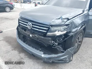2020 Volkswagen Tiguan SE with VIN 3VV3B7AX9LM061569, listed as a IAAI auction lot 41902252 with 33,079 mi miles and . Bid and sale history available at DreamBid. Image 6.