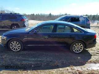2014 Audi A6 Premium Plus z VIN WAUFGAFC4EN124454, wystawiony jako IAAI lot #41653231 z przebiegiem 145 751 mil mil oraz . Historia ofert i sprzedaży dostępna na DreamBid. Obrazek 14.