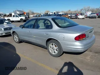 2002 Oldsmobile Intrigue GX z VIN 1G3WH52H02F104930, wystawiony jako IAAI lot #41882923 z przebiegiem 187 601 mil mil oraz . Historia ofert i sprzedaży dostępna na DreamBid. Obrazek 3.