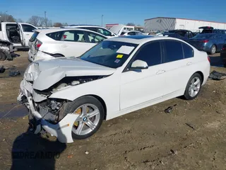 2013 BMW 3 Series 328i with VIN WBA3C1G55DNR49447, listed as a IAAI auction lot 41296098 with 126,605 mi miles and . Bid and sale history available at DreamBid. Image 2.