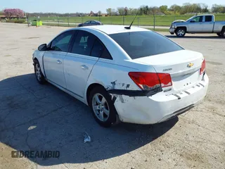 2014 Chevrolet Cruze 1LT with VIN 1G1PC5SB0E7261699, listed as a IAAI auction lot 42011008 with 164,699 mi miles and . Bid and sale history available at DreamBid. Image 3.