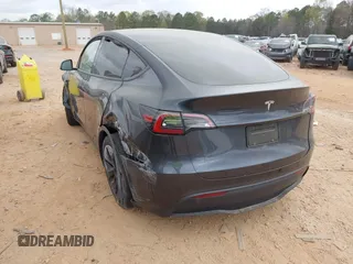 2024 Tesla Model Y with VIN 7SAYGDED3RA303113, listed as a IAAI auction lot 41915760 with 12,917 mi miles and . Bid and sale history available at DreamBid. Image 3.