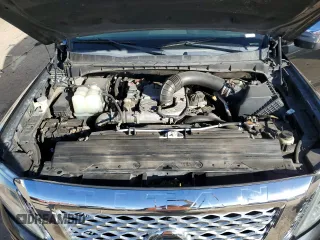 2017 Nissan Titan SL z VIN 1N6BA1F20HN522403, wystawiony jako Copart lot #87477114 z przebiegiem 98 084 mil mil oraz Szkoda całkowita • Salvage title. Historia ofert i sprzedaży dostępna na DreamBid. Obrazek 13.
