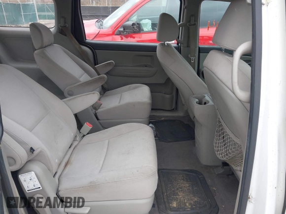2015 Kia Sedona L with VIN KNDMA5C12F6031286, listed as a IAAI auction lot 42002214 with 185,814 mi miles. Bid and sale history available at carsss.com. Image 8.