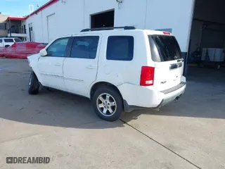 2010 Honda Pilot Touring with VIN 5FNYF4H85AB038734, listed as a IAAI auction lot 39101387 with 1 mi miles. Bid and sale history available at carsss.com. Image 3.