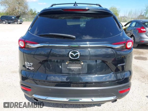 2021 Mazda CX-9 Signature with VIN JM3TCBEY1M0539786, listed as a IAAI auction lot 42264611 with 51,168 mi miles and . Bid and sale history available at DreamBid. Image 16.