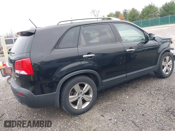 2012 Kia Sorento EX with VIN 5XYKU4A22CG251847, listed as a IAAI auction lot 42014433 with 166,186 mi miles. Bid and sale history available at carsss.com. Image 4.