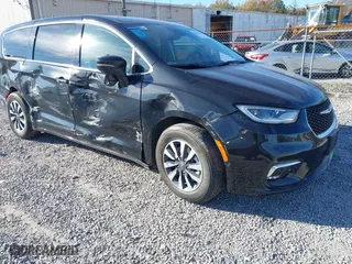2023 Chrysler Pacifica Hybrid Touring L with VIN 2C4RC1L79PR592477, listed as a IAAI auction lot 40823333 with 8,729 mi miles. Bid and sale history available at carsss.com. Image 1.