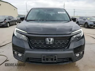 2021 Honda Passport EX-L with VIN 5FNYF7H54MB000021, listed as a Copart auction lot 75745334 with 50,941 mi miles and Clean Title. Bid and sale history available at carsss.com. Image 5.