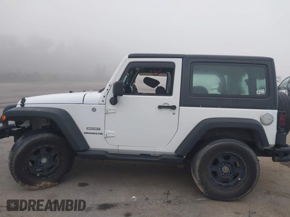 2013 Jeep Wrangler Sport z VIN 1C4AJWAG9DL653348, wystawiony jako IAAI lot #42096860 z przebiegiem 55 575 mil mil oraz . Historia ofert i sprzedaży dostępna na DreamBid. Obrazek 14.