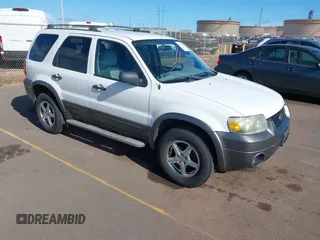 2006 Ford Escape XLT with VIN 1FMCU03116KA05836, listed as a IAAI auction lot 42310284 with 128,620 mi miles and . Bid and sale history available at DreamBid. Image 1.