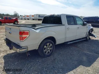 2013 Ford F-150 XL with VIN 1FTFW1CT4DFB15983, listed as a IAAI auction lot 41357017 with 203,996 mi miles. Bid and sale history available at carsss.com. Image 4.