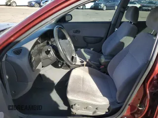2001 Kia Sephia z VIN KNAFB121015028494, wystawiony jako Copart lot #81581404 z przebiegiem 86 655 mil mil oraz Szkody całkowita. Historia ofert i sprzedaży dostępna na DreamBid. Obrazek 7.