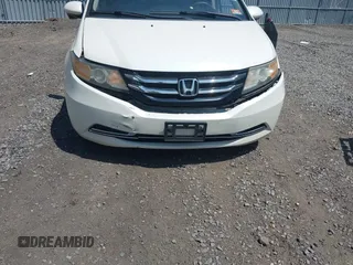 2015 Honda Odyssey EX-L with VIN 5FNRL5H64FB069742, listed as a IAAI auction lot 42101807 with 152,611 mi miles and . Bid and sale history available at DreamBid. Image 6.