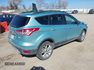 2013 Ford Escape SEL with VIN 1FMCU9HX2DUA71931, listed as a IAAI auction lot 41757318 with 149,344 mi miles. Bid and sale history available at carsss.com. Image 4.