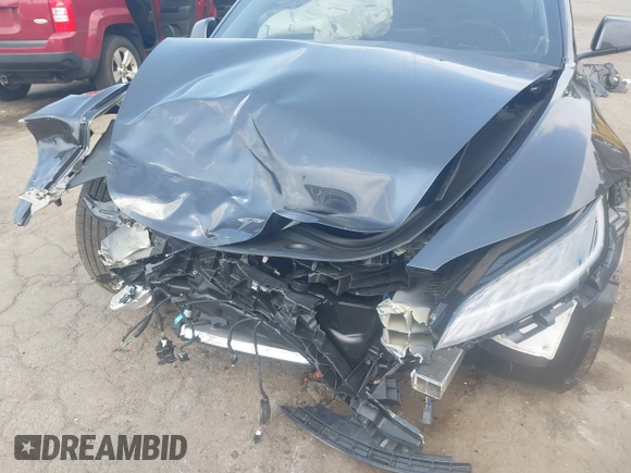 2025 Tesla Model 3 Long Range with VIN 5YJ3E1EB2SF899446, listed as a IAAI auction lot 42478353 with Not provided miles and . Bid and sale history available at DreamBid. Image 6.