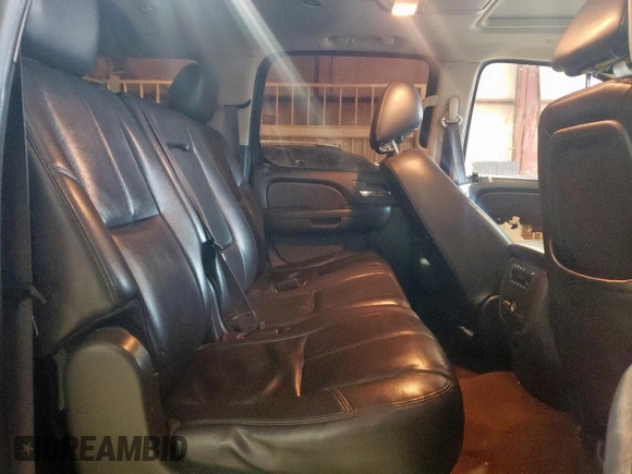 2014 Chevrolet Suburban LT z VIN 1GNSCJE04ER201392, wystawiony jako Copart lot #58076755 z przebiegiem 229 288 mil mil oraz Szkoda całkowita • Salvage title. Historia ofert i sprzedaży dostępna na DreamBid. Obrazek 11.