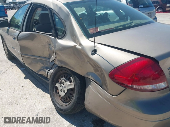 2006 Ford Taurus SE with VIN 1FAFP53U96A223924, listed as a IAAI auction lot 41828443 with 114,653 mi miles. Bid and sale history available at carsss.com. Image 15.