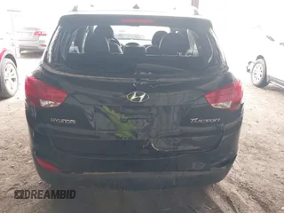 2010 Hyundai Tucson GLS with VIN KM8JU3AC0AU070395, listed as a IAAI auction lot 41933773 with 18,097 mi miles and . Bid and sale history available at DreamBid. Image 6.